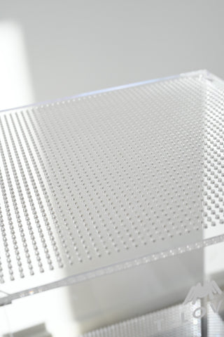 The fully perforated lid